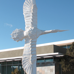 “Flying Peace,” a collaboration between origami artist Robert Lang and sculptor Kevin Box, stands outside White Rock Branch Library near Los Alamos, New Mexico